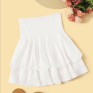 White ruffled skirt